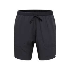 NIKE Športové nohavice  čierna / strieborná