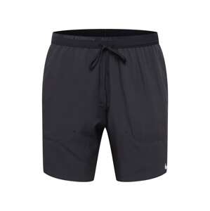 NIKE Športové nohavice  čierna / strieborná
